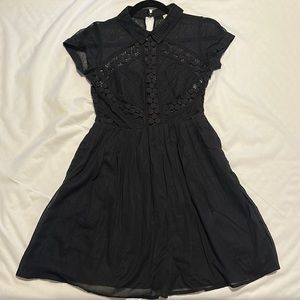Super cute Free People dress w/mesh-lace cutout detail. Flare skirt with pockets